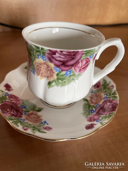 A dreamy English rose tea cup with small plate.