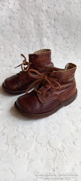 Old leather children's shoes