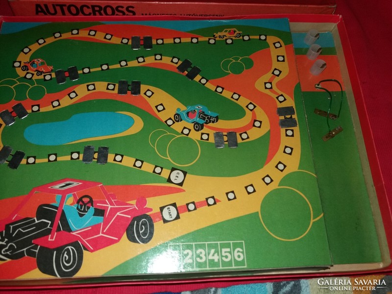 Old autocross interactive board game, only the box and playing area are in excellent condition as shown in the pictures