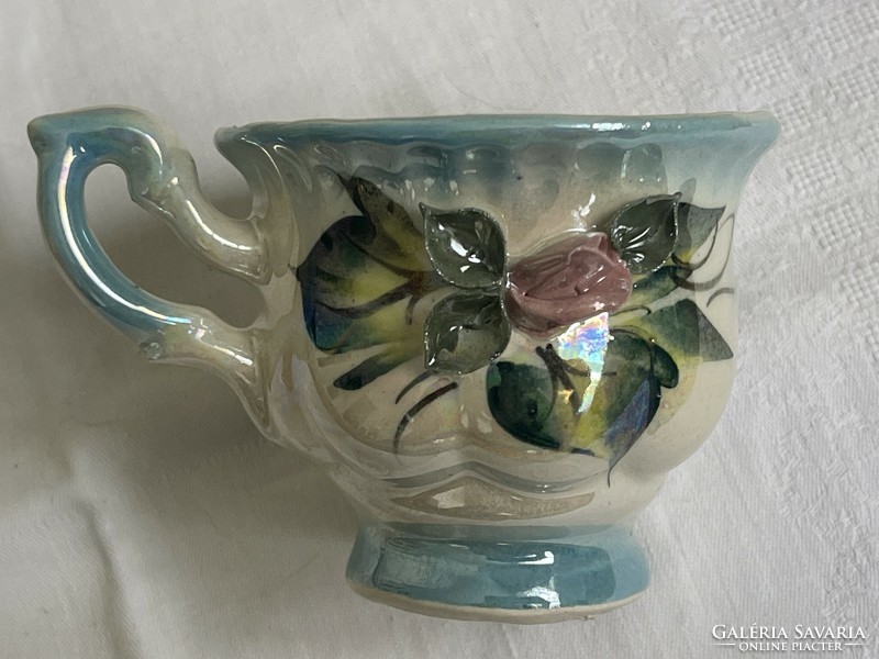 Dreamy antique earthenware teacup decorated with hand-painted plastic flowers