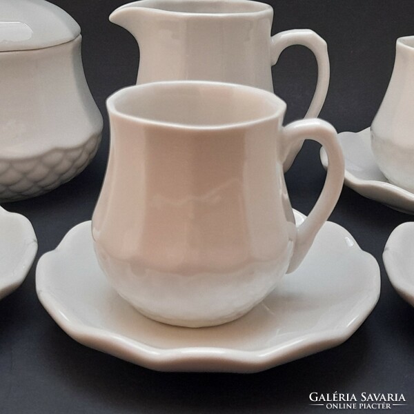 Pieces of the Witeg stoneware porcelain coffee set in one piece, small mug with a spout