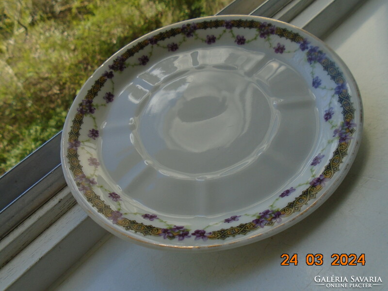 Gebruder, art nouveau tea cup with violet garland and saucer