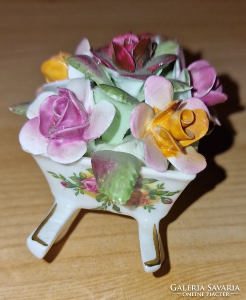 Porcelain wheelbarrow with flowers