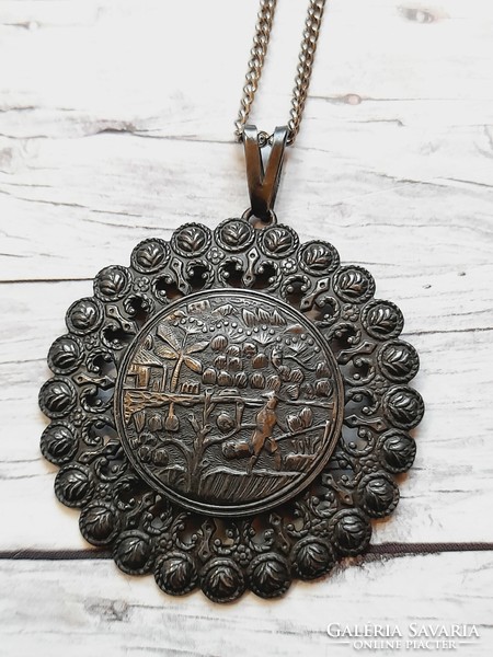 Silver-plated Vietnamese pendant on a chain