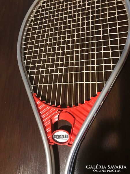 Stomil brand metal frame tennis racket. The red plastic part is damaged, but it does not move. Made in Poland