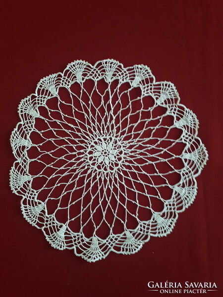 Delicate crocheted lace tablecloth