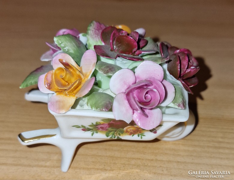 Porcelain wheelbarrow with flowers