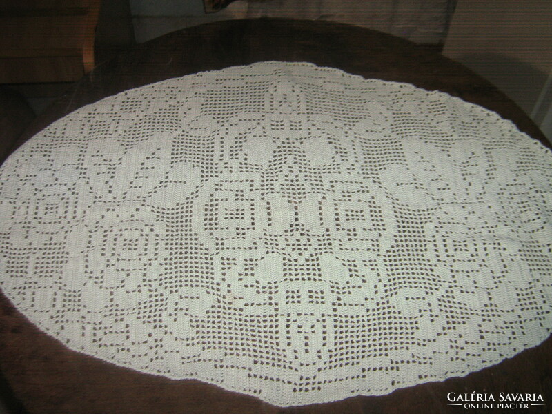 Beautiful pale green antique hand-crocheted rose tablecloth
