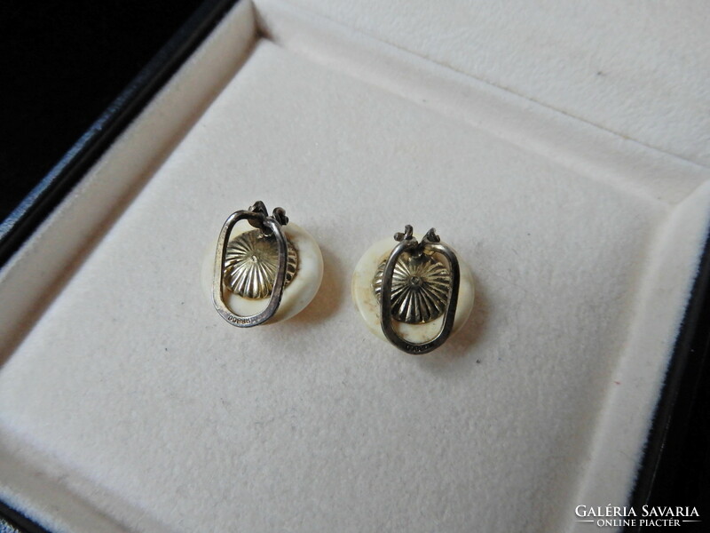 Antique tusk? A pair of carved earrings with gold-plated silver fittings