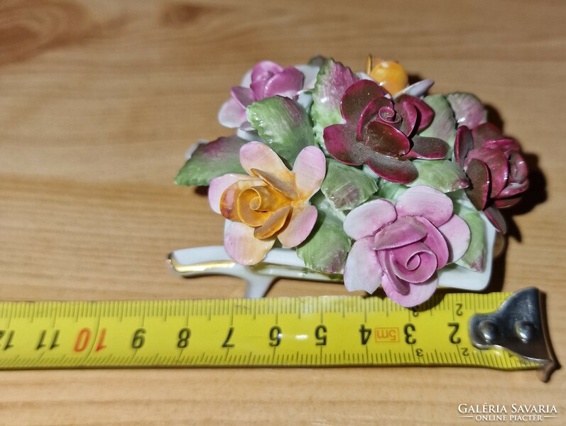 Porcelain wheelbarrow with flowers