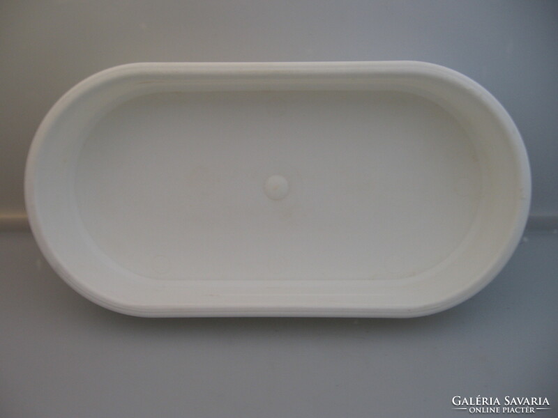 Oval white plastic bowl