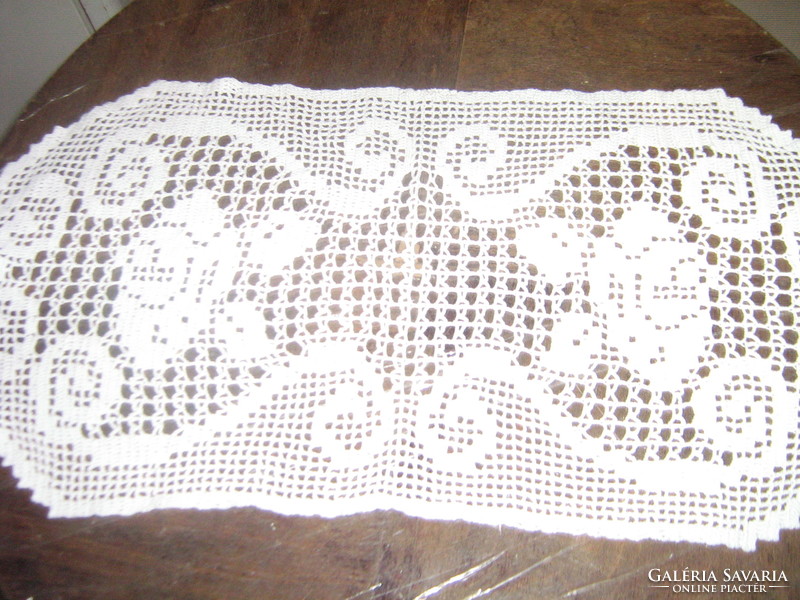 Beautiful white antique hand-crocheted rose tablecloth