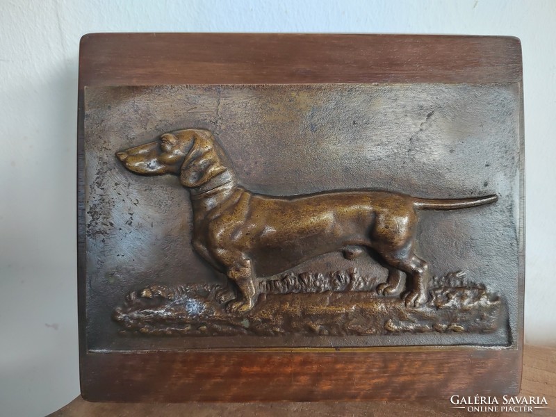 Bronze dachshund dog wall picture plaque on a wooden board, circa 1940