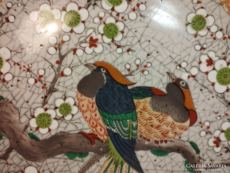 Japanese porcelain plate with birds of paradise