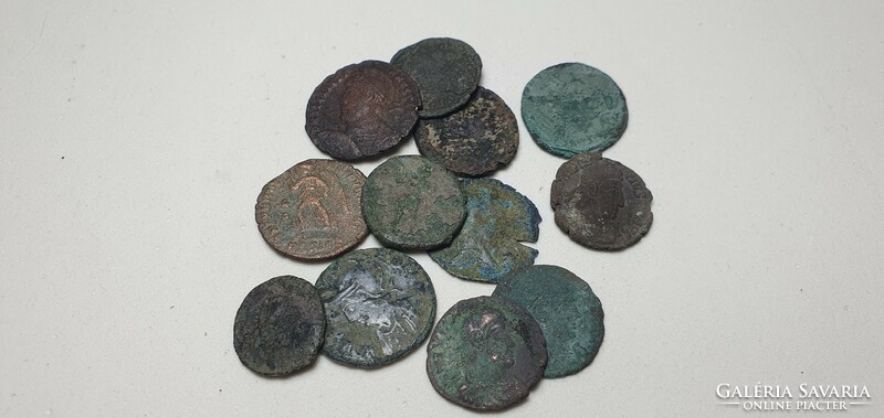 12 antique coins from the era of the Roman Empire.