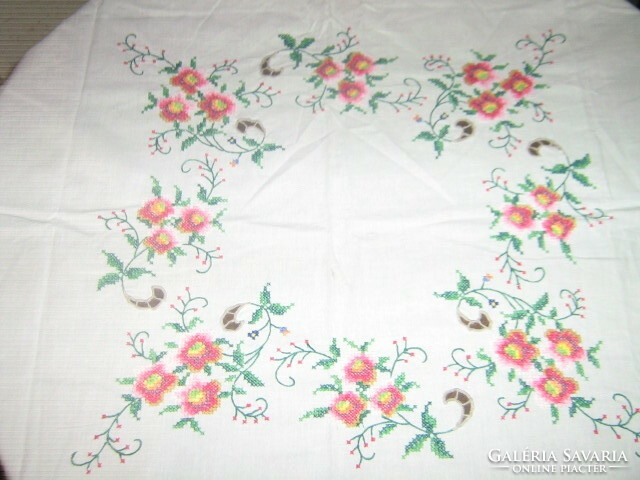 Beautiful small cross-stitched floral tablecloth
