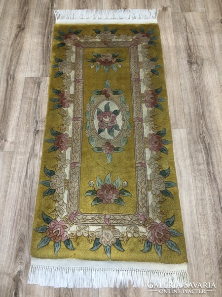 Chinese hand-knotted wool rug, 60 x 143 cm