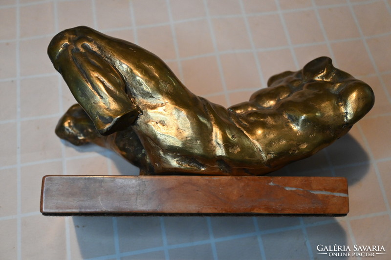 Polished bronze nude torso, statue, on a marble slab