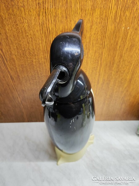 Retro soda siphon penguin
