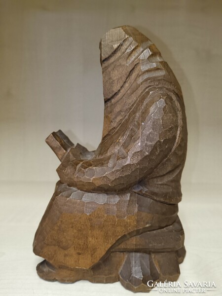 Reading man made of wood