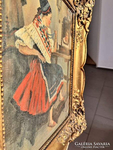 Young girl in folk costume, antique painting in blonde frame
