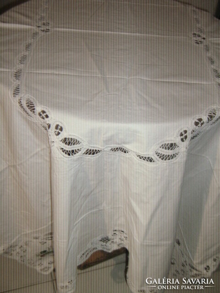 Beautiful white lace tablecloth with a special wild duck embroidered ribbon