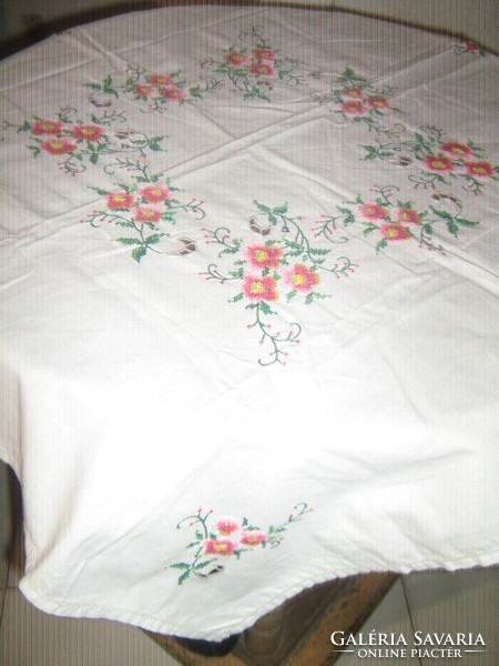 Beautiful small cross-stitched floral tablecloth