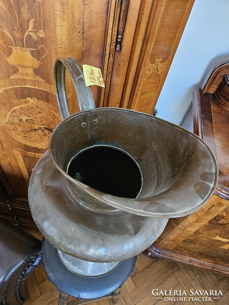 Jug made of copper with a large handle