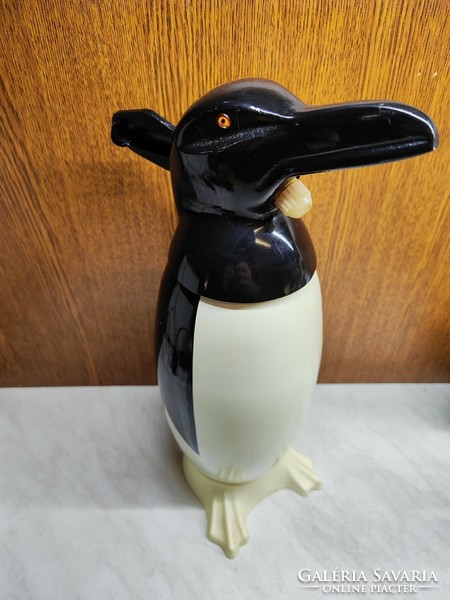 Retro soda siphon penguin