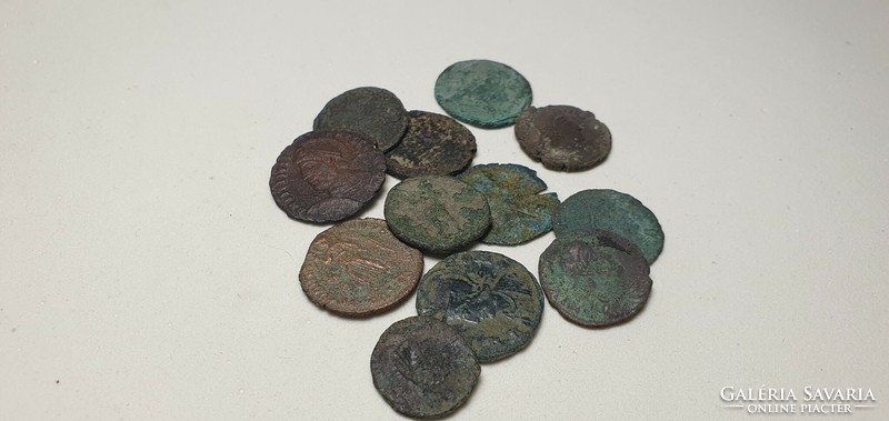 12 antique coins from the era of the Roman Empire.