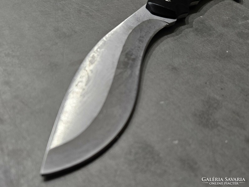 Kandar, kukri-type fighting knife, with a leather sheath