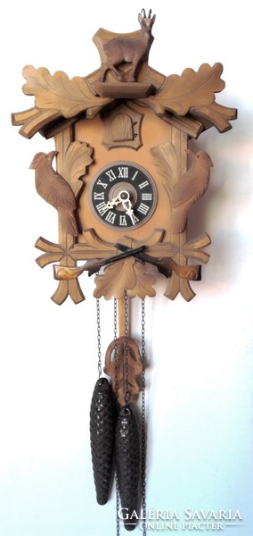Carved black forest cuckoo clock with chamois