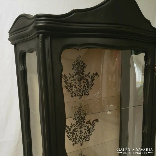 Renovated black neo-baroque display case