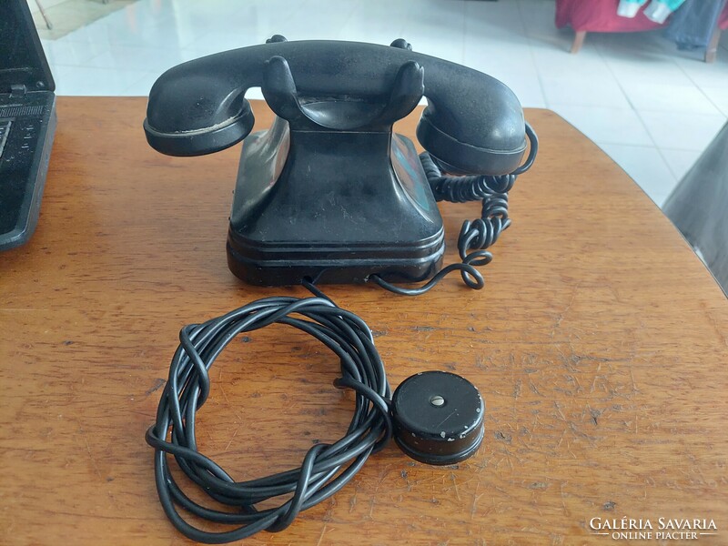 Retro vinyl dial phone with old connector