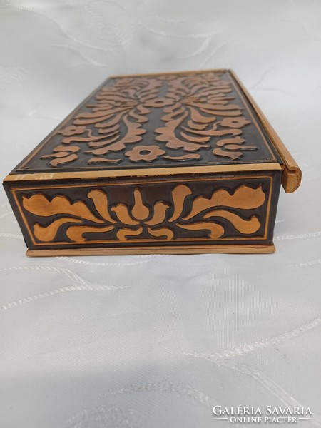 Musical wooden box, decorated with copper