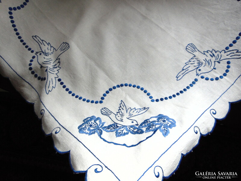 Antique embroidered linen tablecloth with birds