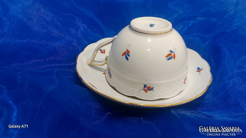 Antique porcelain tea and coffee cup from Herend.