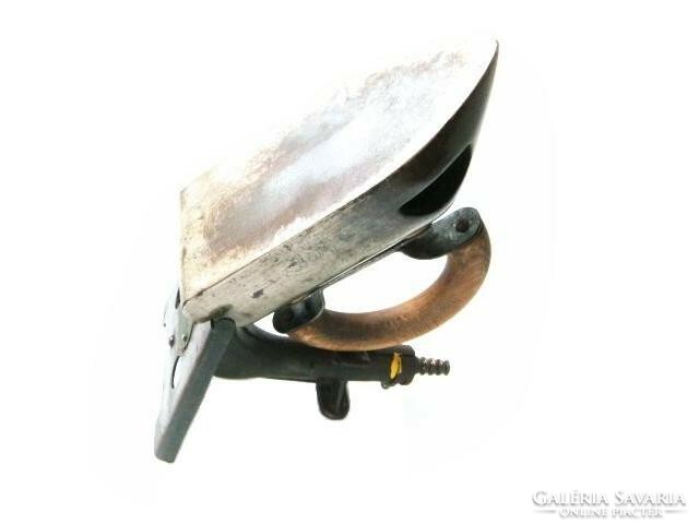 Antique gas iron with heating nozzle, from the early 1900s.