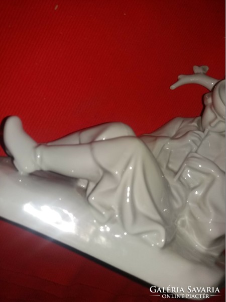 Antique rare Zsolnay porcelain figurine of a shepherd playing the flute lying down, white 22 x 23 cm as shown in the pictures