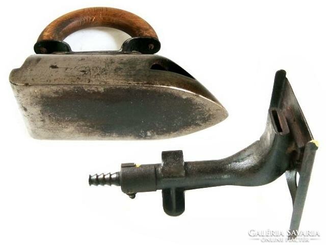 Antique gas iron with heating nozzle, from the early 1900s.
