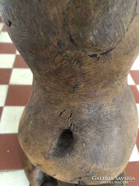 Mother with child, large-scale wooden sculpture made of roots