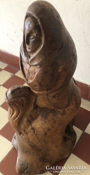 Mother with child, large-scale wooden sculpture made of roots