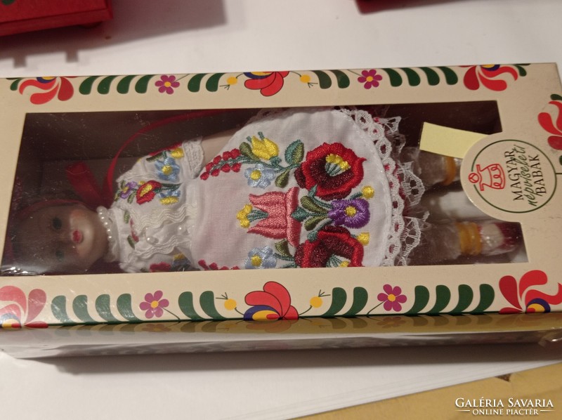 Unopened folk doll, with furniture, in good condition