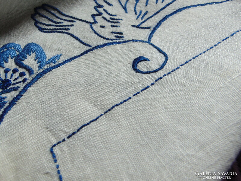 Antique embroidered linen tablecloth with birds