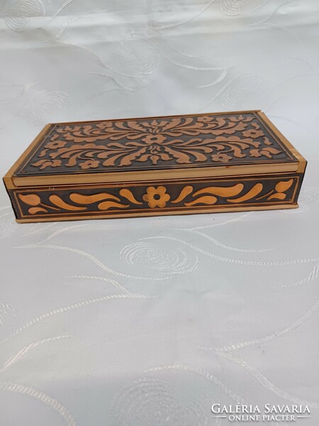 Musical wooden box, decorated with copper