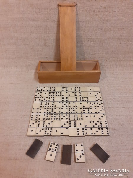 Old domino game in a sophisticated hardwood box