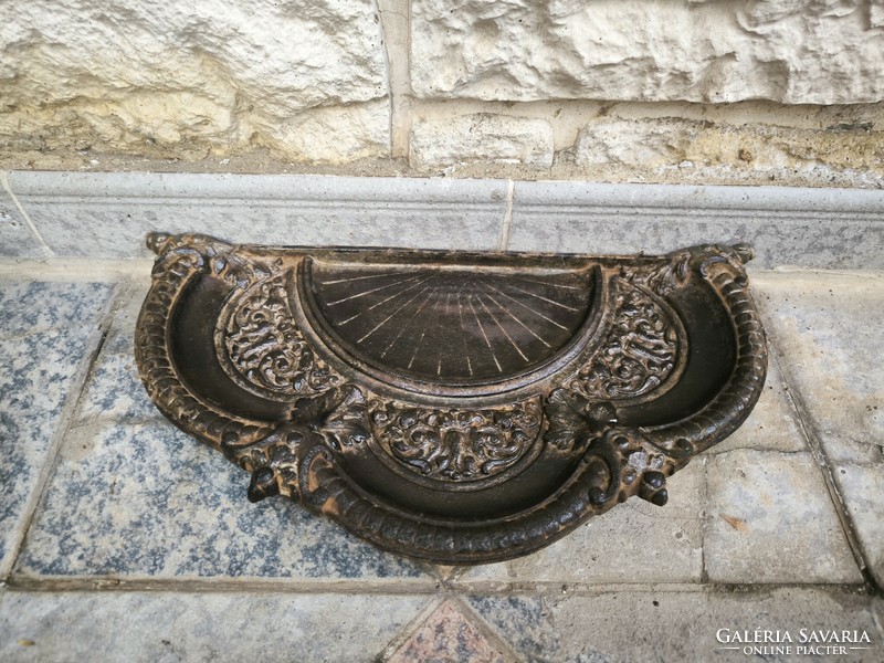 Beautiful art nouveau cast iron stove front spark arrester with ash ember catch ornate pattern.