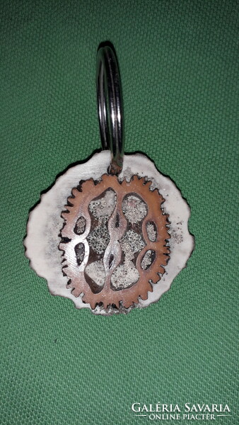 Keychain for collectors made of retro hunter antler slices, as shown in the pictures