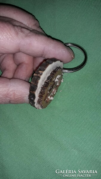 Keychain for collectors made of retro hunter antler slices, as shown in the pictures