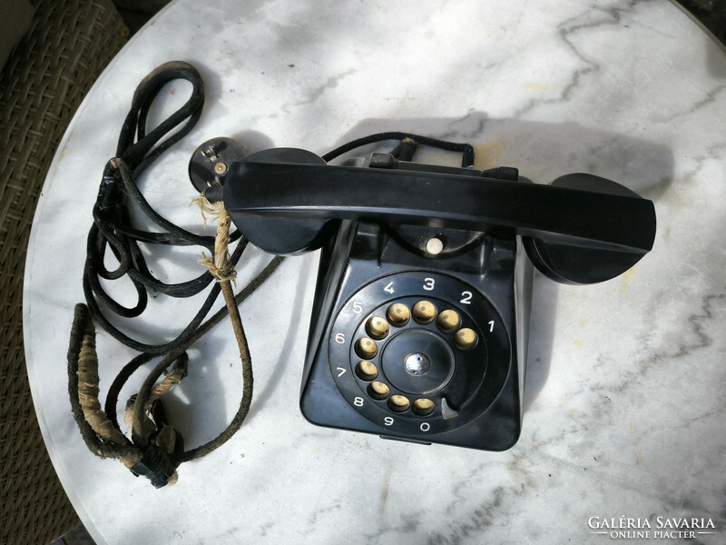 Bakelite telephone, old type with dial. (Hungarian Post)